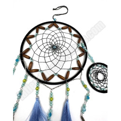 Atrapasueños con plumas de pavo real